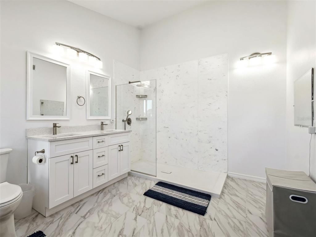 Bathroom, Dual Sink Vanities, Glass Shower, Interior, Marble, Marble Walls