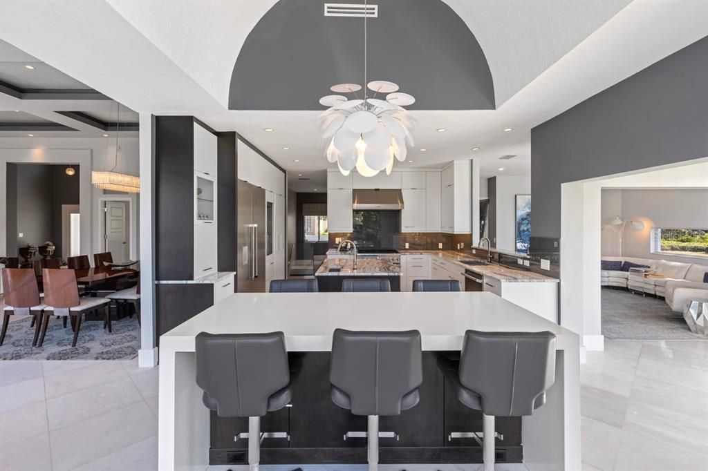 Chandelier, Dining room, Interior, Kitchen, Living room, Pendant Lights, Recessed Lighting, Stainless Steel Appliances