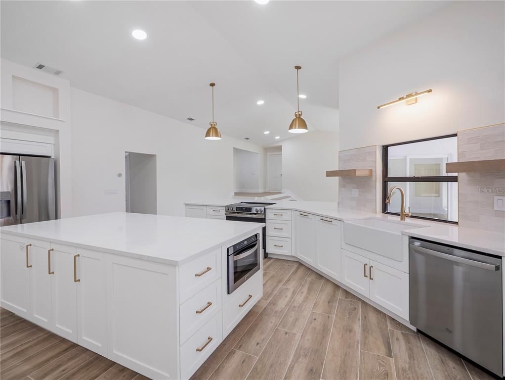 Interior, Kitchen, Pendant Lights, Recessed Lighting, Stainless Steel Appliances, Wood Texture Flooring