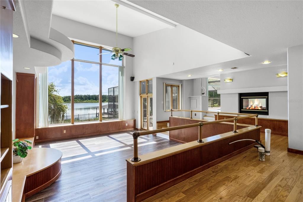 Fireplace, Interior, Recessed Lighting, Water, Wood Texture Flooring