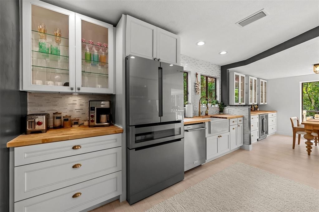 Dining room, Interior, Kitchen, Recessed Lighting, Stainless Steel Appliances, Wood Texture Flooring