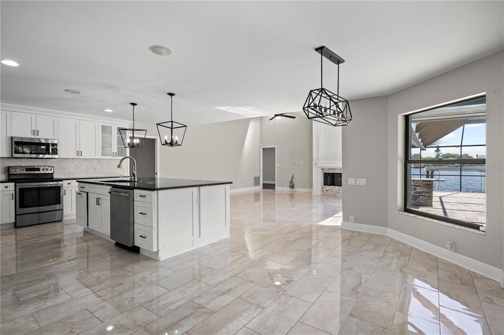 Fireplace, Interior, Kitchen, Pendant Lights, Recessed Lighting, Stainless Steel Appliances