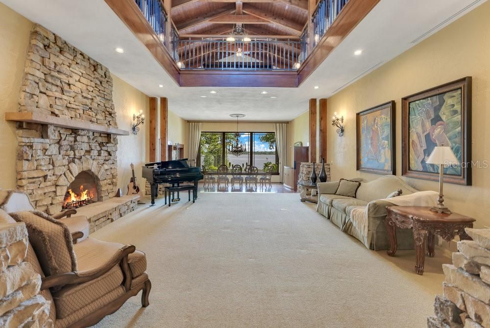 Fireplace, Interior, Living room, Piano, Recessed Lighting, Stone Walls, Wooden Beams