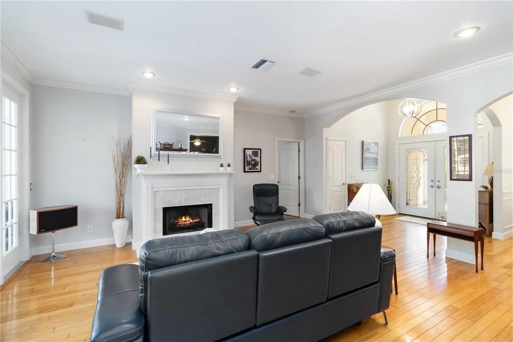 Fireplace, Interior, Living room, Recessed Lighting, Wood Texture Flooring