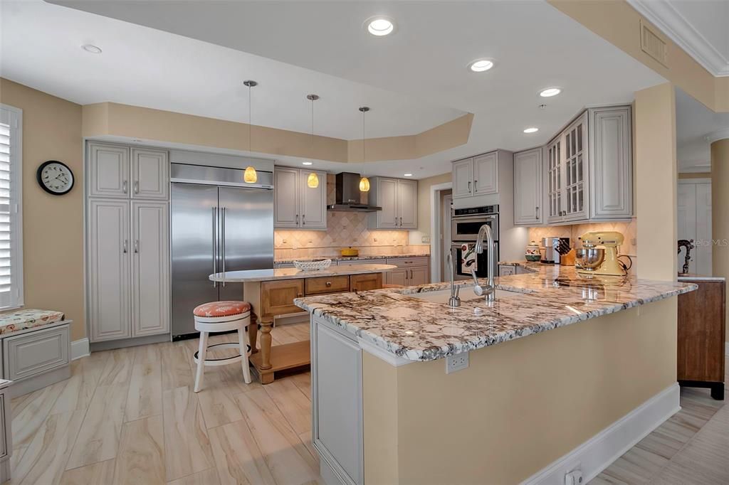 Interior, Kitchen, Marble, Pendant Lights, Recessed Lighting, Stainless Steel Appliances, Wood Texture Flooring