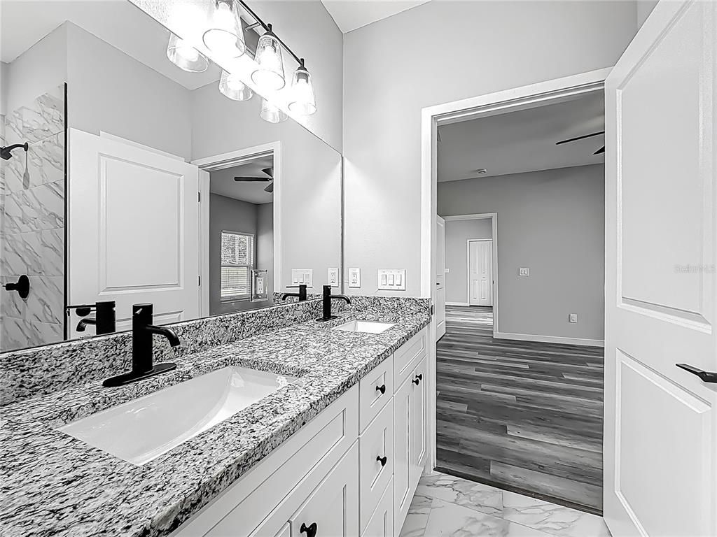 Bathroom, Dual Sink Vanities, Interior, Marble, Marble Walls, Wood Texture Flooring
