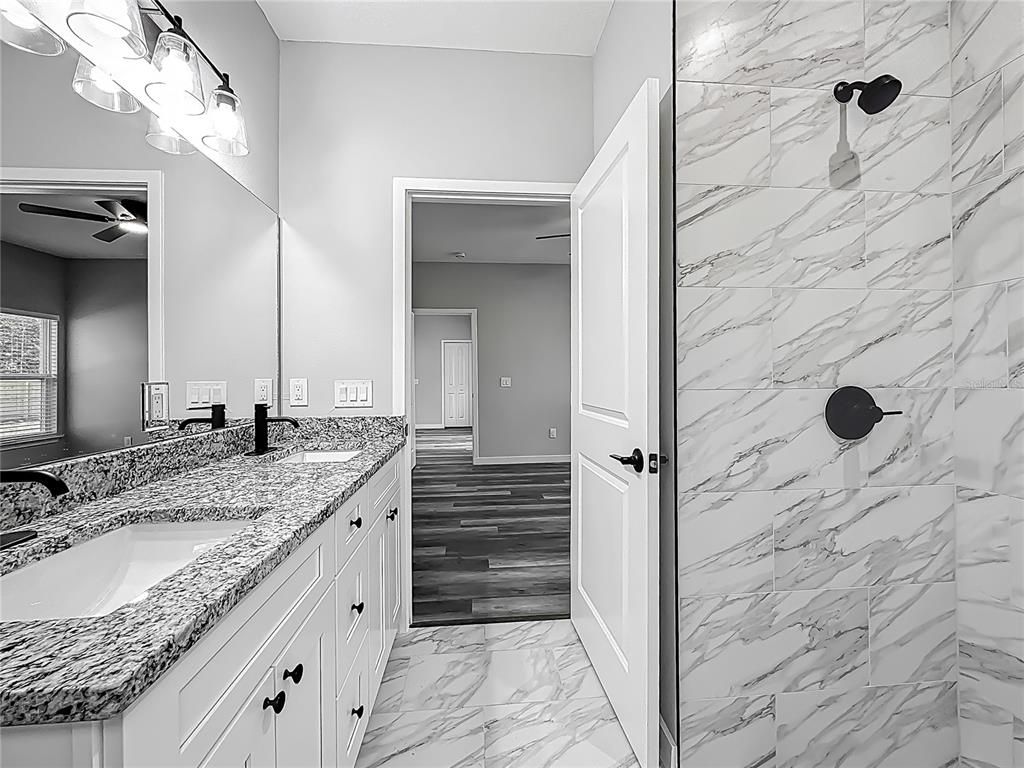 Bathroom, Dual Sink Vanities, Interior, Marble, Marble Walls, Wood Texture Flooring