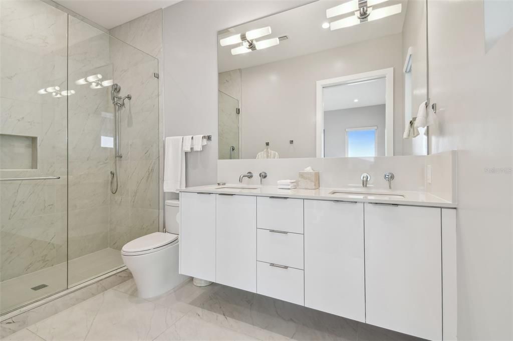 Bathroom, Dual Sink Vanities, Glass Shower, Interior, Marble, Marble Walls
