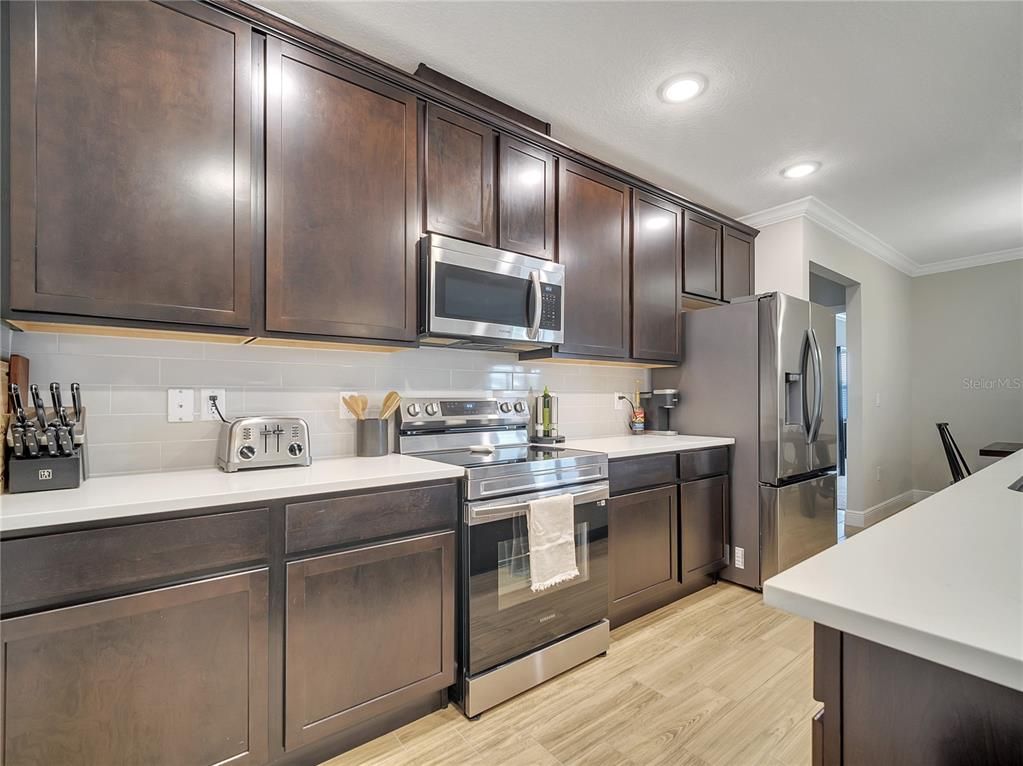 Interior, Kitchen, Recessed Lighting, Stainless Steel Appliances, Wood Texture Flooring