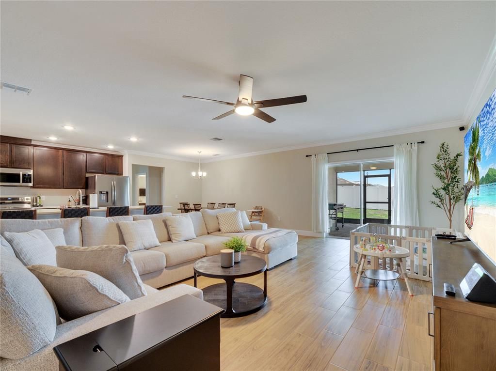 Dining room, Interior, Kitchen, Living room, Pendant Lights, Recessed Lighting, Stainless Steel Appliances, Wood Texture Flooring