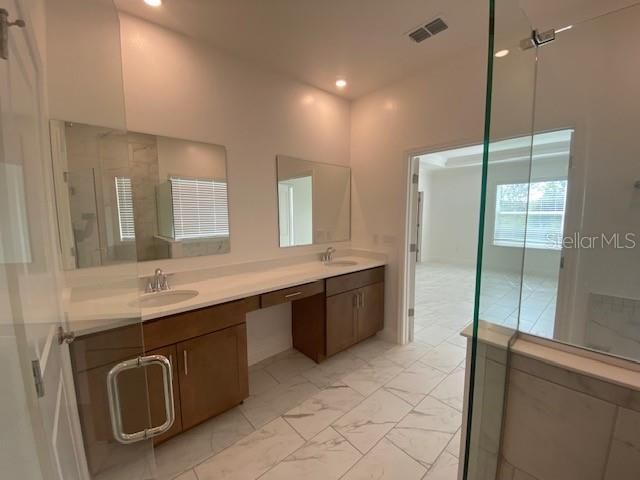 Bathroom, Dual Sink Vanities, Glass Shower, Interior, Marble, Recessed Lighting