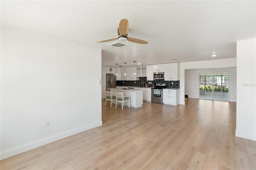 Dining room, Empty room, Interior, Kitchen, Pendant Lights, Recessed Lighting, Wood Texture Flooring