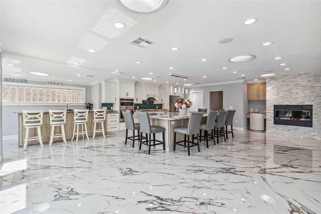 Fireplace, Interior, Kitchen, Marble, Pendant Lights, Recessed Lighting, Stone Walls