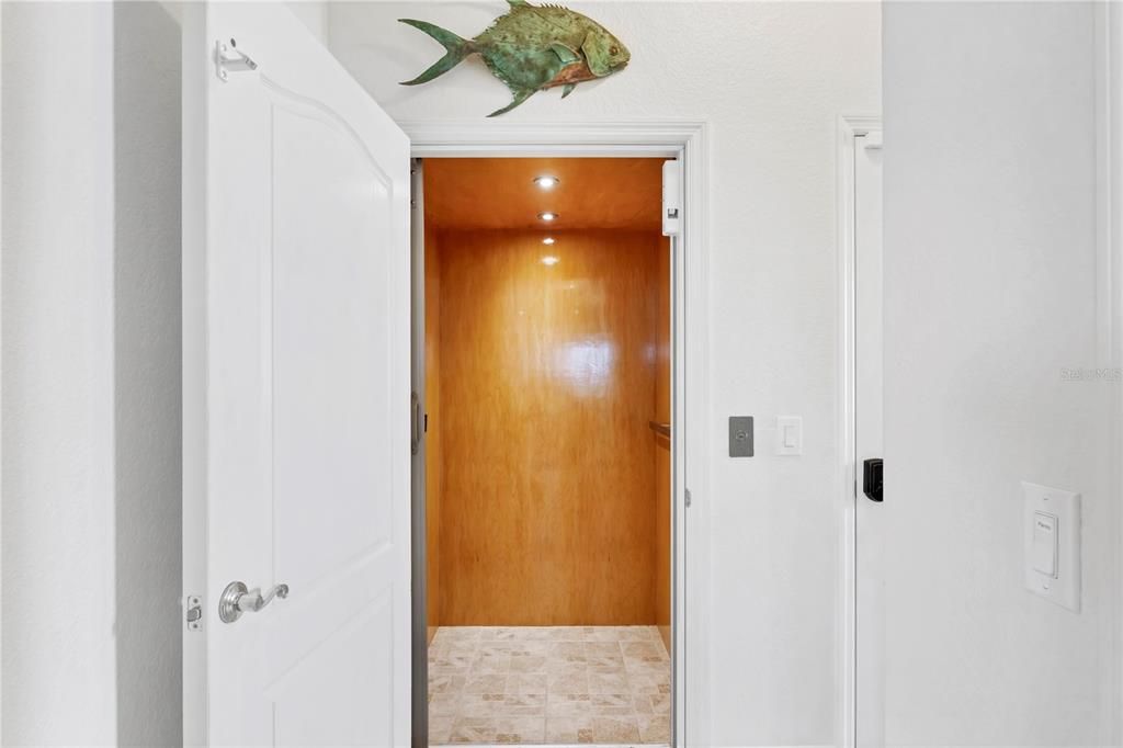 Elevator, Interior, Recessed Lighting, Wooden Ceilings, Wooden Walls
