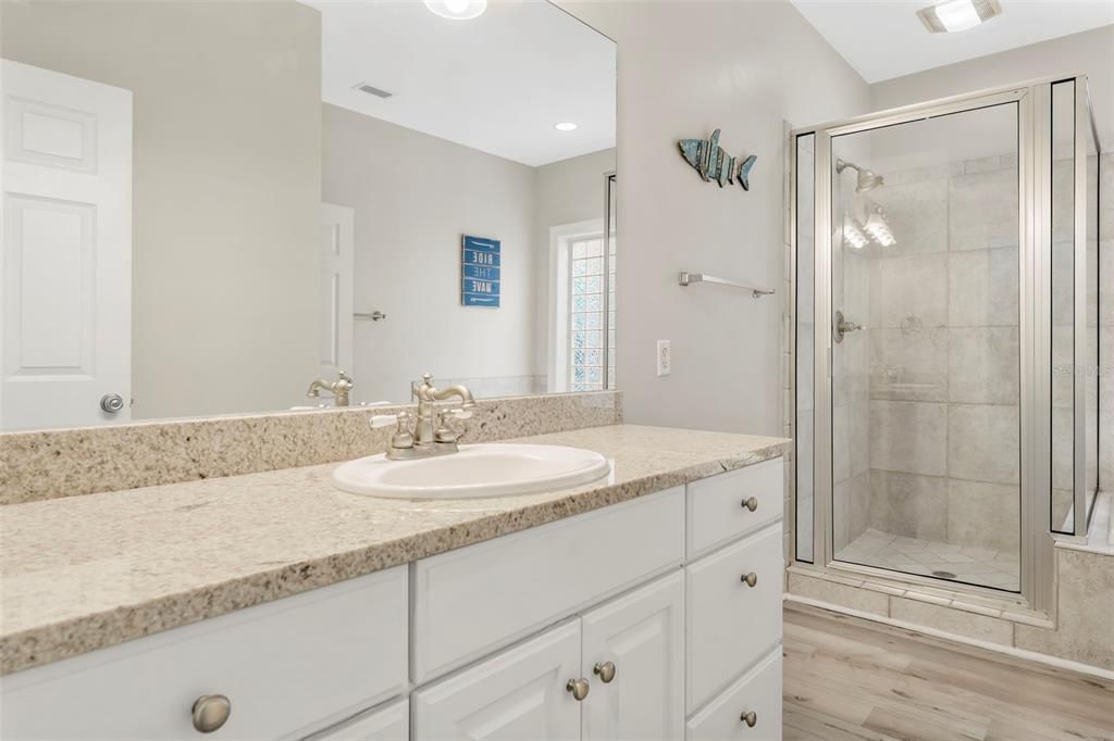 Bathroom, Glass Shower, Interior, Recessed Lighting, Wood Texture Flooring