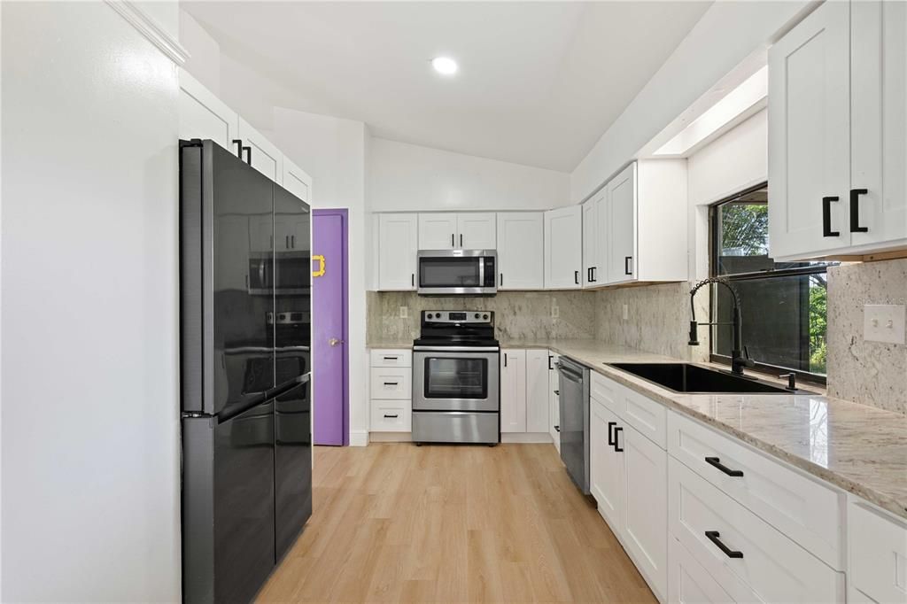 Interior, Kitchen, Recessed Lighting, Stainless Steel Appliances, Wood Texture Flooring