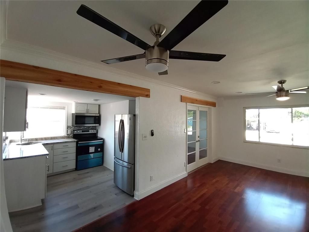 Empty room, Interior, Kitchen, Stainless Steel Appliances, Wood Texture Flooring