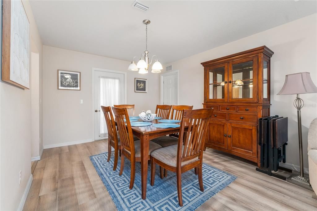 Chandelier, Dining room, Interior, Pendant Lights, Wood Texture Flooring