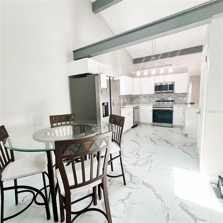 Dining room, Interior, Kitchen, Marble, Pendant Lights, Stainless Steel Appliances