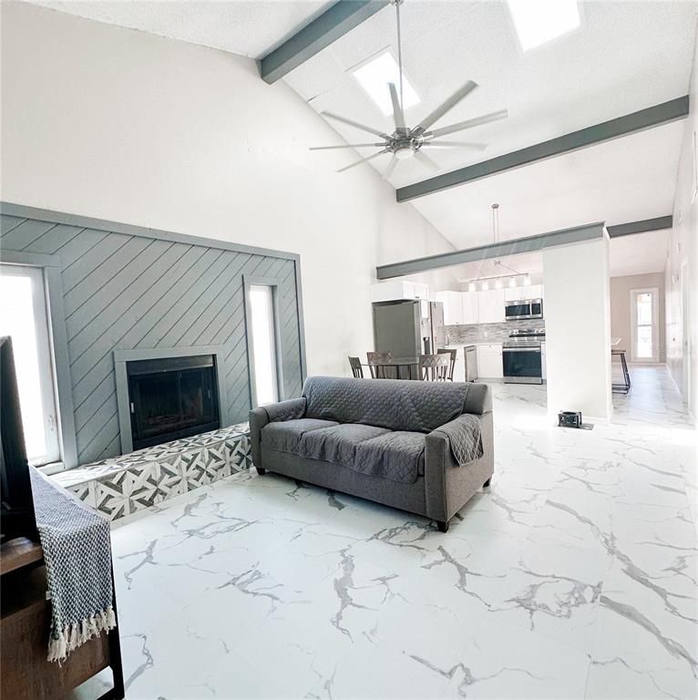 Dining room, Fireplace, Interior, Kitchen, Living room, Marble, Pendant Lights, Stainless Steel Appliances, Wooden Beams