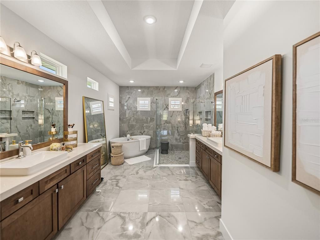 Bathroom, Dual Sink Vanities, Free Standing Baths, Glass Shower, Interior, Marble, Marble Walls, Recessed Lighting