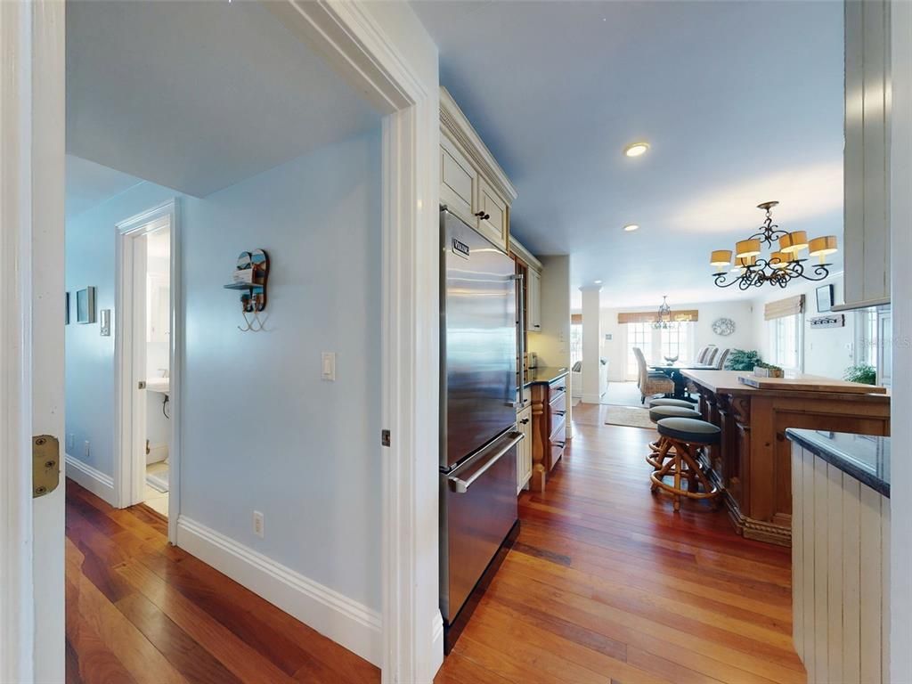 Chandelier, Dining room, Interior, Kitchen, Recessed Lighting, Stainless Steel Appliances, Wood Texture Flooring