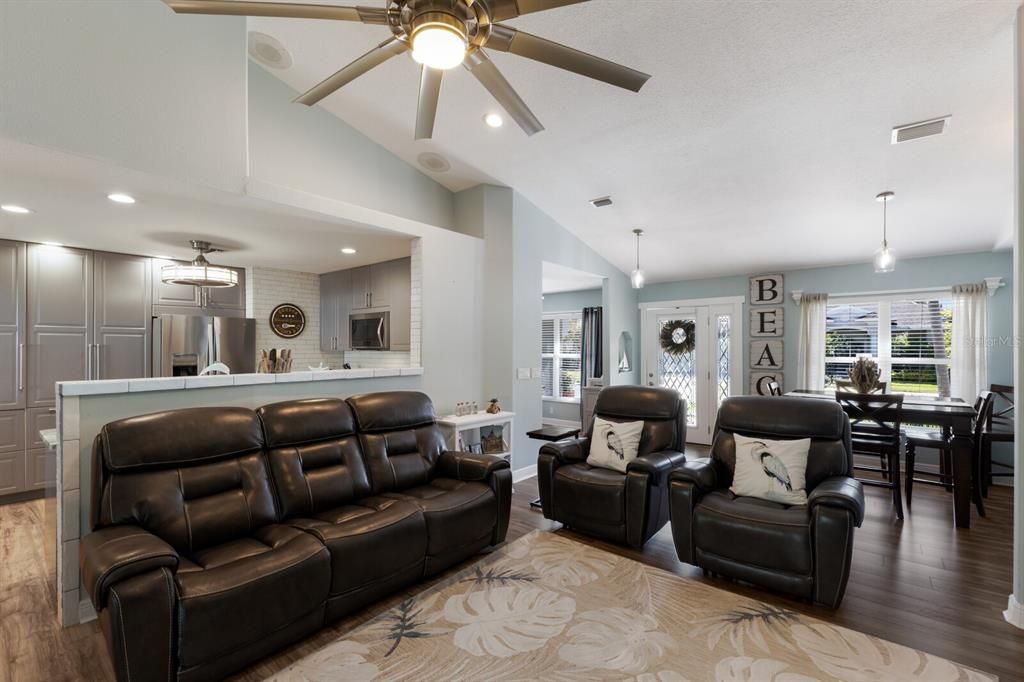 Dining room, Interior, Kitchen, Living room, Pendant Lights, Recessed Lighting, Stainless Steel Appliances, Wood Texture Flooring