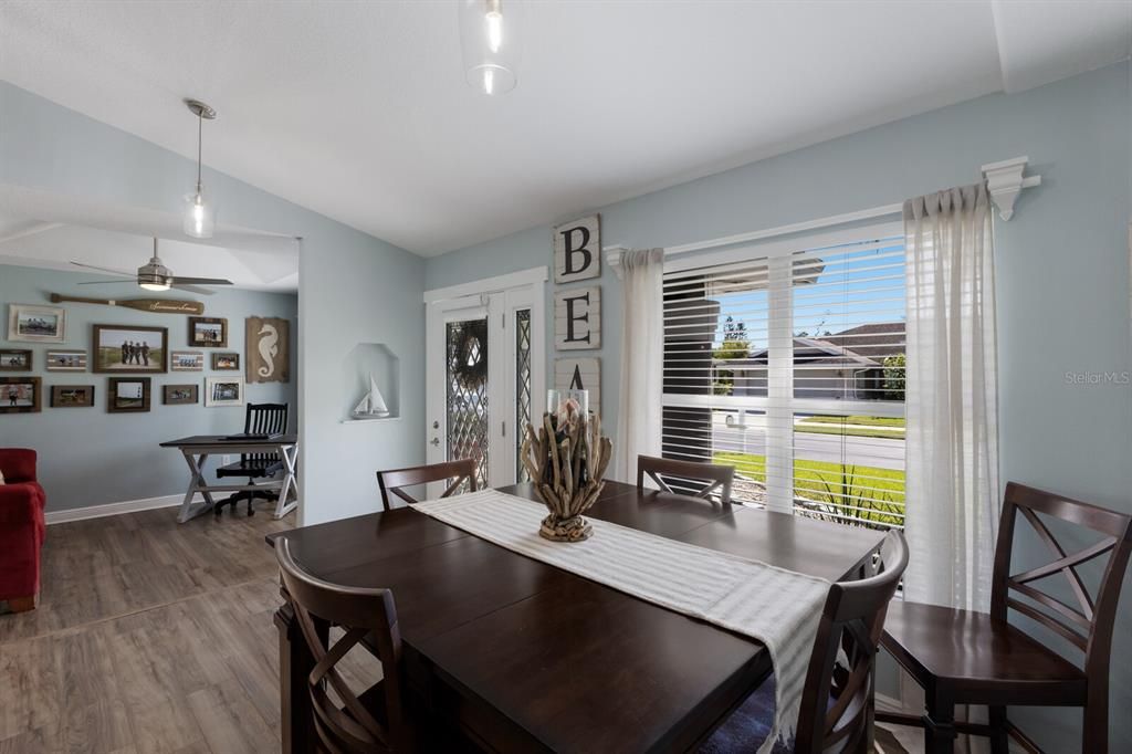 Dining room, Interior, Pendant Lights, Piano, Wood Texture Flooring