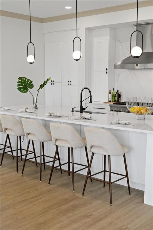 Interior, Kitchen, Marble Walls, Pendant Lights, Recessed Lighting, Wood Texture Flooring
