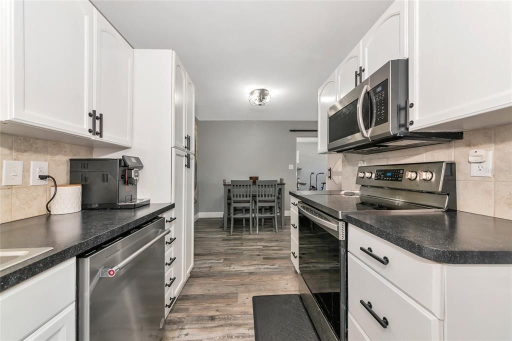 Dining room, Interior, Kitchen, Stainless Steel Appliances, Wood Texture Flooring