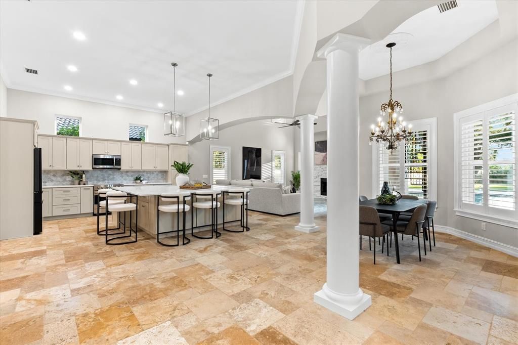 Chandelier, Dining room, Fireplace, Interior, Kitchen, Living room, Pendant Lights, Recessed Lighting, Stainless Steel Appliances