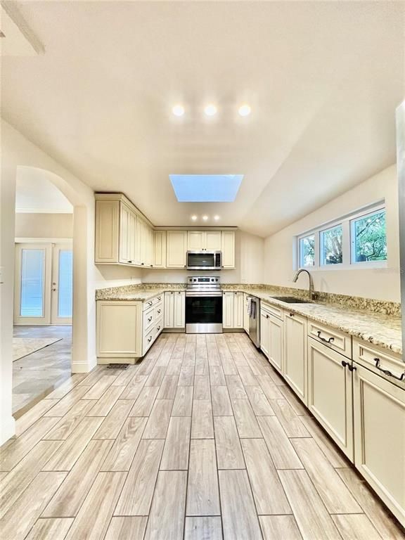 Interior, Kitchen, Recessed Lighting, Stainless Steel Appliances, Wood Texture Flooring