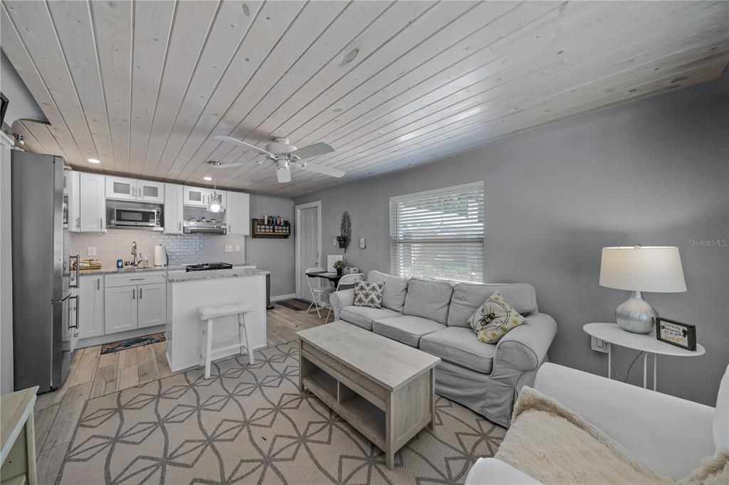 Interior, Kitchen, Living room, Recessed Lighting, Stainless Steel Appliances, Wooden Ceilings, Wood Texture Flooring