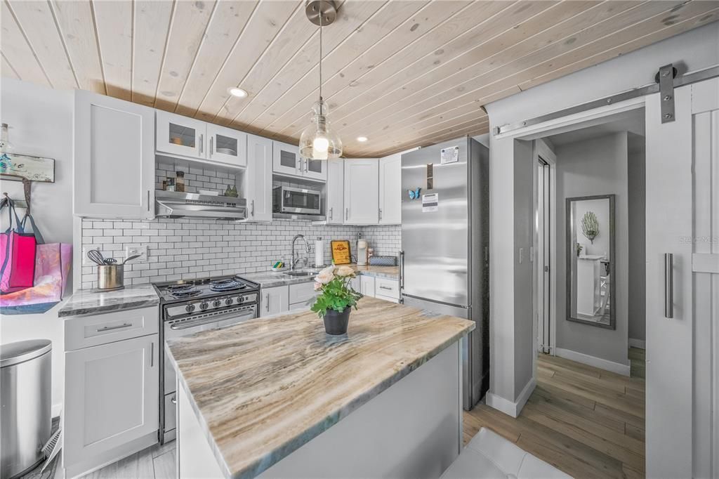 Interior, Kitchen, Pendant Lights, Recessed Lighting, Stainless Steel Appliances, Wooden Ceilings, Wood Texture Flooring