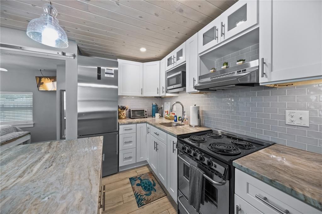 Interior, Kitchen, Pendant Lights, Recessed Lighting, Stainless Steel Appliances, Wooden Ceilings, Wood Texture Flooring
