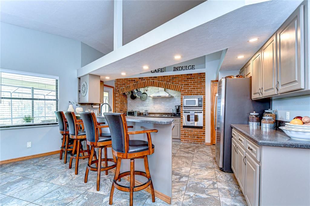 Interior, Kitchen, Recessed Lighting, Stainless Steel Appliances, Stone Walls