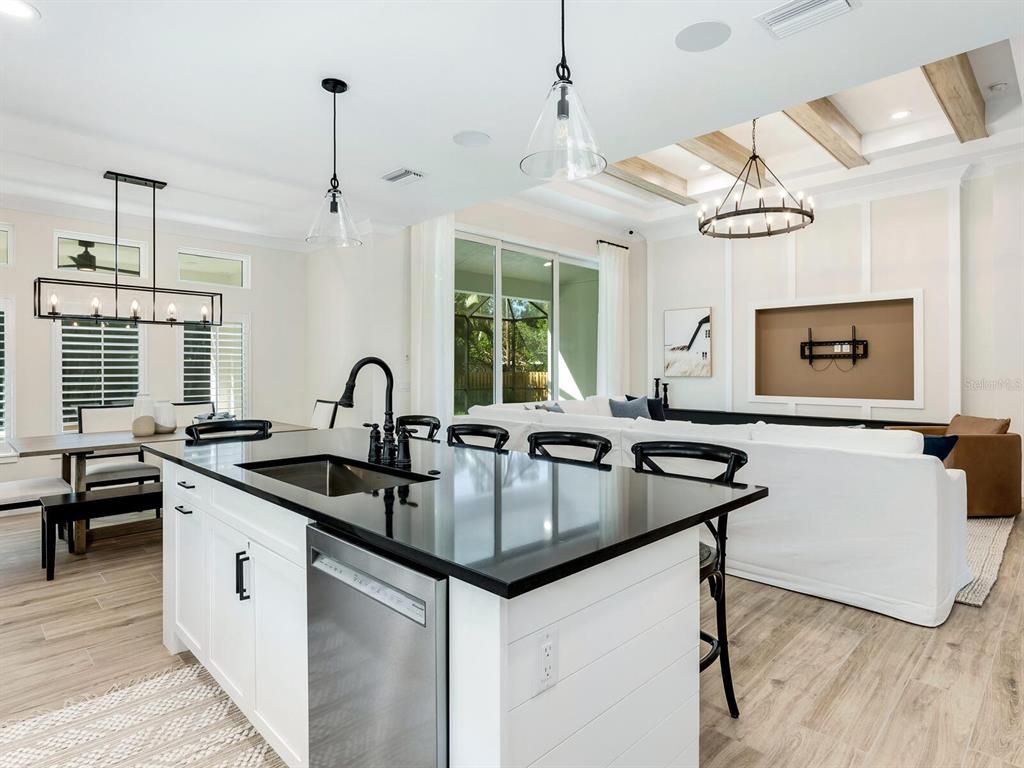 Chandelier, Dining room, Interior, Kitchen, Living room, Pendant Lights, Recessed Lighting, Wooden Beams, Wood Texture Flooring
