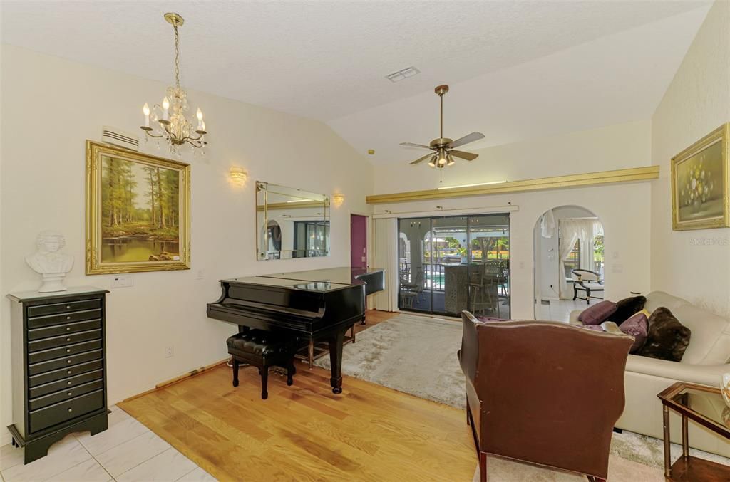 Chandelier, Interior, Living room, Piano, Wood Texture Flooring