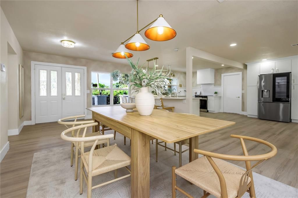 Dining room, Interior, Kitchen, Pendant Lights, Recessed Lighting, Stainless Steel Appliances, Wood Texture Flooring