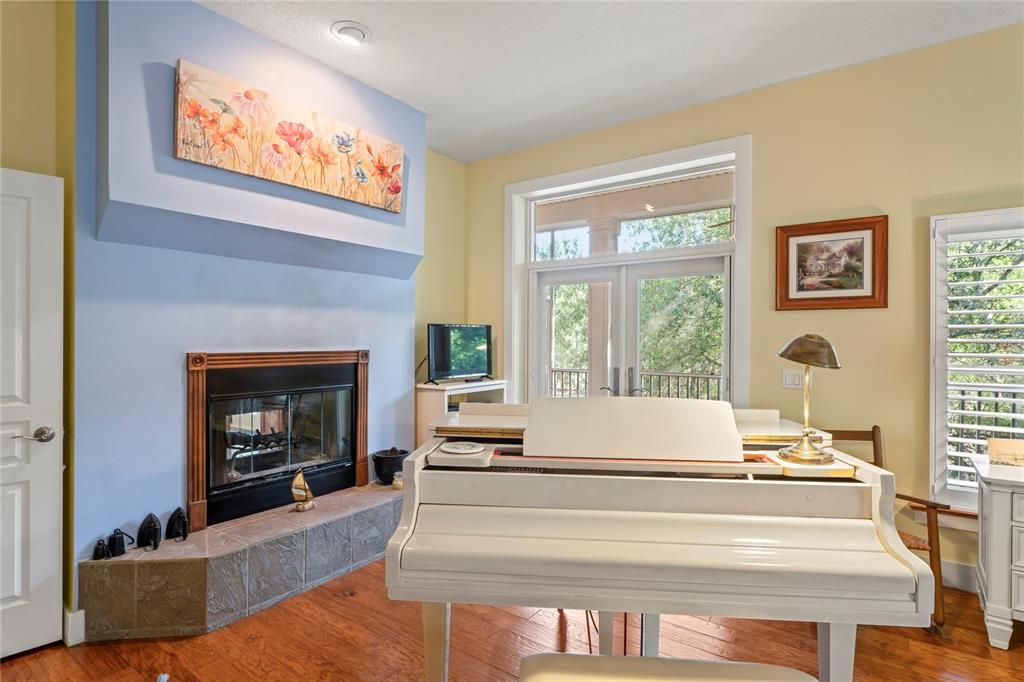 Fireplace, Home Office, Interior, Piano, Recessed Lighting, Wood Texture Flooring