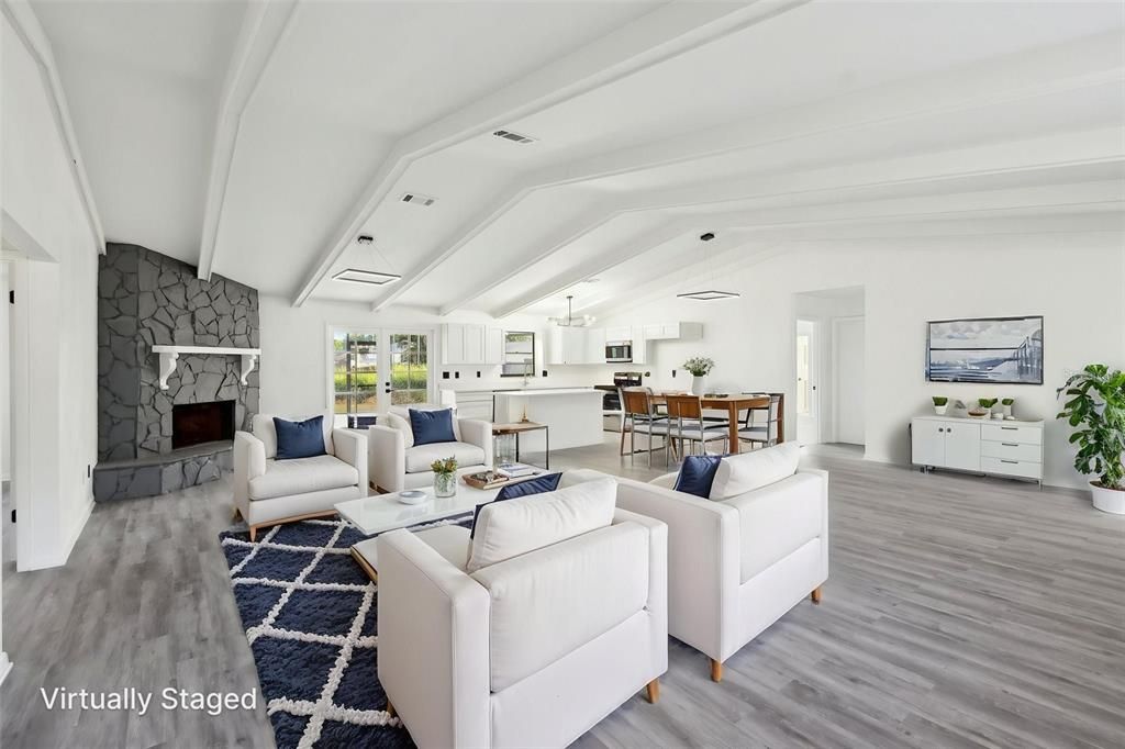 Dining room, Fireplace, Interior, Kitchen, Living room, Pendant Lights, Stone Walls, Wood Texture Flooring
