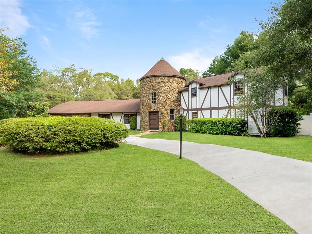 Attached, Backyard, Exterior, Facade, Brick Facade, Tudor Revival