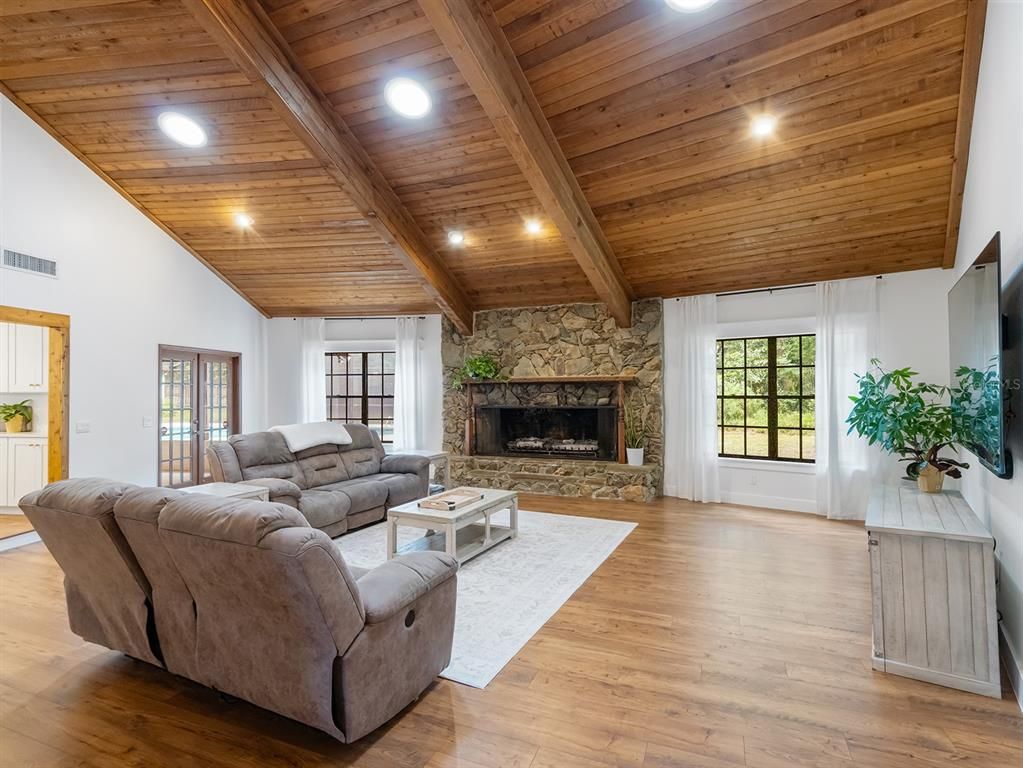 Fireplace, Interior, Living room, Recessed Lighting, Wooden Beams, Wooden Ceilings, Wood Texture Flooring