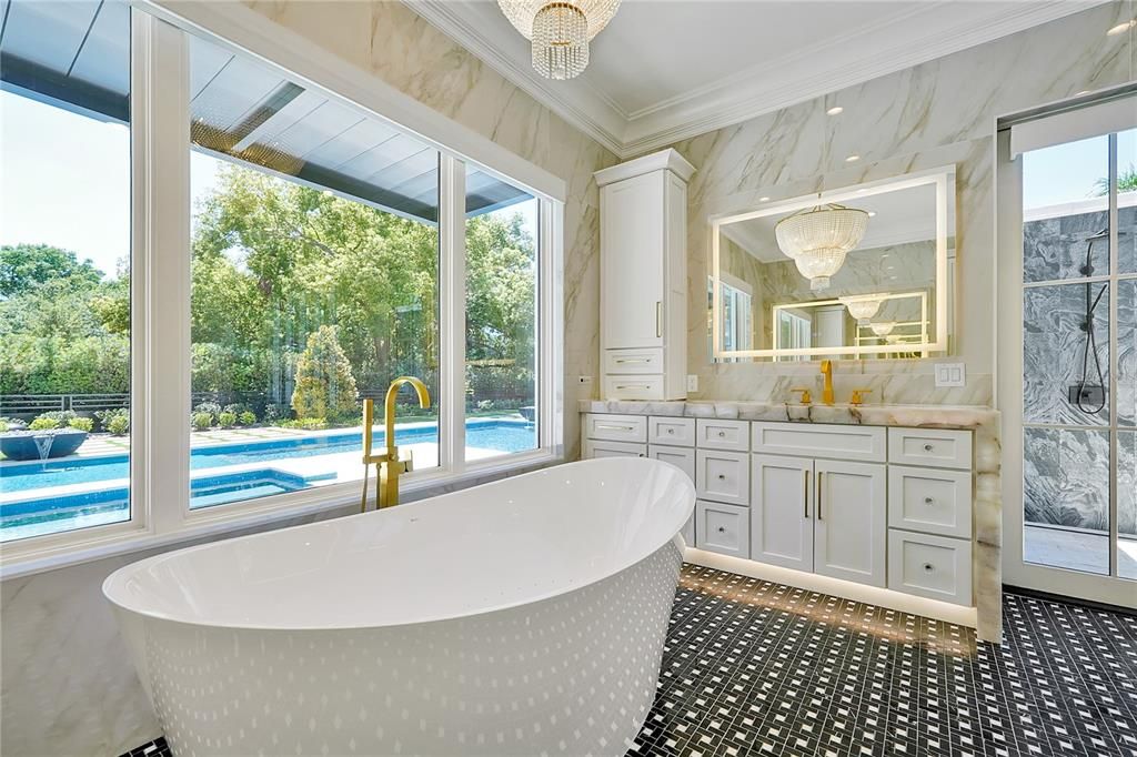 Bathroom, Chandelier, Dual Sink Vanities, Free Standing Baths, Interior, Marble Walls, Recessed Lighting