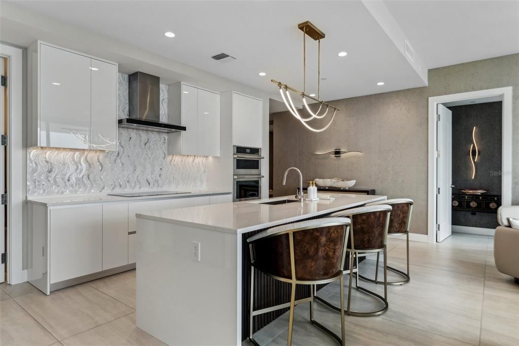 Interior, Kitchen, Marble Walls, Pendant Lights, Recessed Lighting, Stainless Steel Appliances
