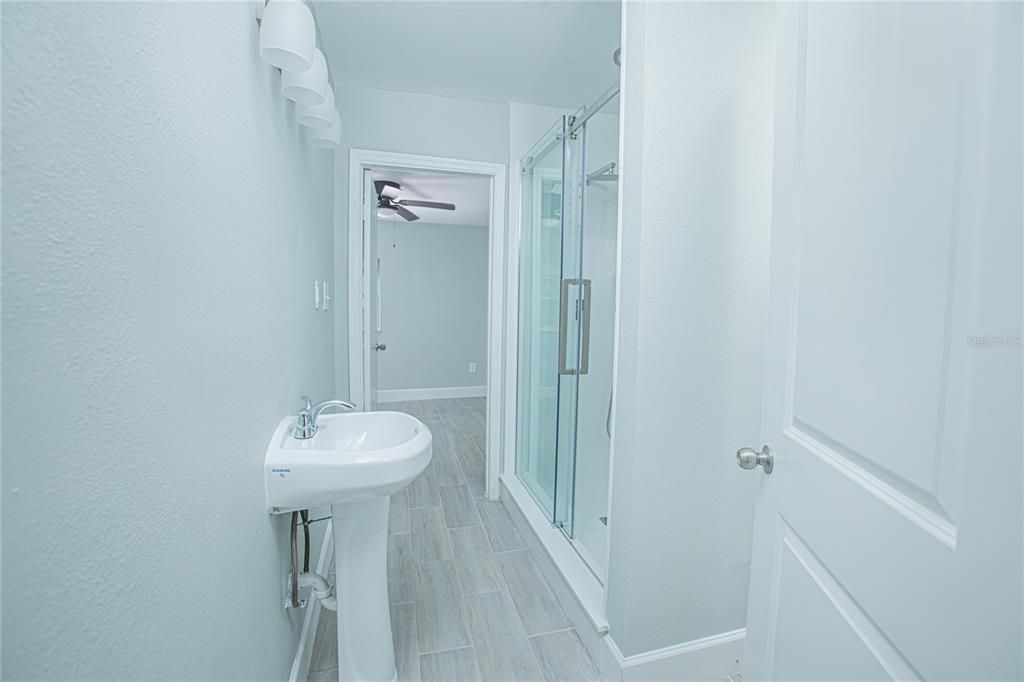 Bathroom, Glass Shower, Interior, Wood Texture Flooring
