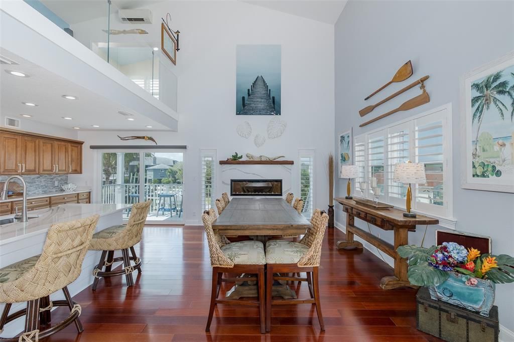 Dining room, Fireplace, Interior, Kitchen, Recessed Lighting, Wood Texture Flooring