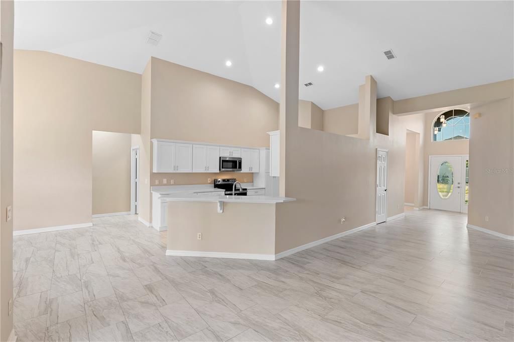Interior, Kitchen, Marble, Recessed Lighting, Stainless Steel Appliances, Wood Texture Flooring