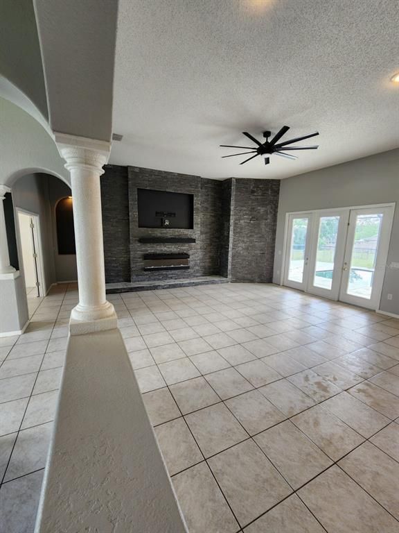 Empty room, Fireplace, Interior, Recessed Lighting, Stone Walls