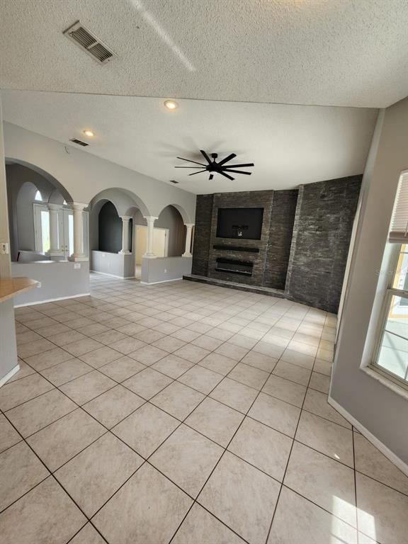 Empty room, Fireplace, Interior, Recessed Lighting, Stone Walls
